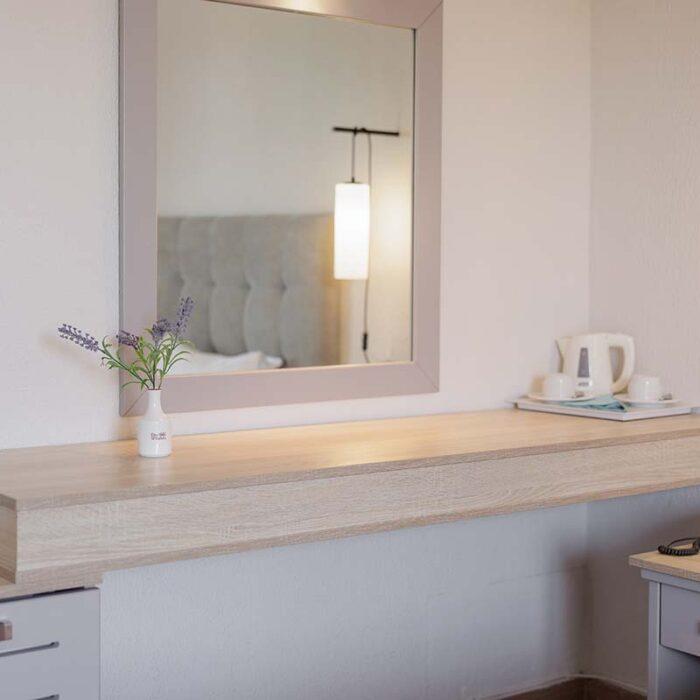 accommodation nafsika room mirror desk other side